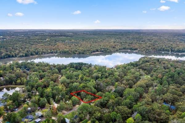 Aerial drone photography showing vacant land property boundaries
